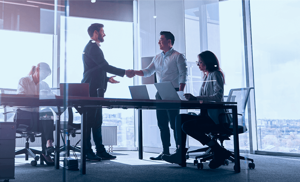 people-standing-near-table-team-young-businessmen-working-communicating-together-office